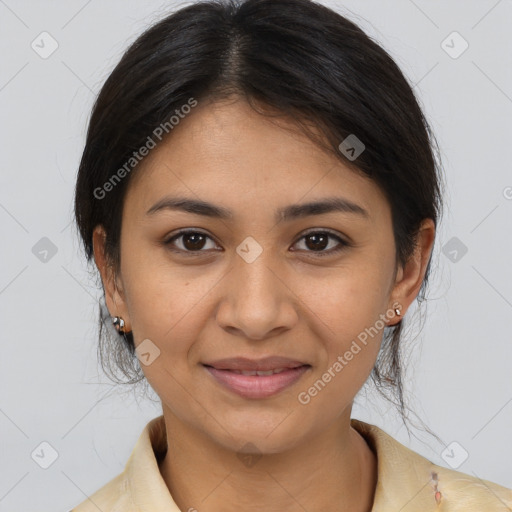 Joyful latino young-adult female with medium  brown hair and brown eyes