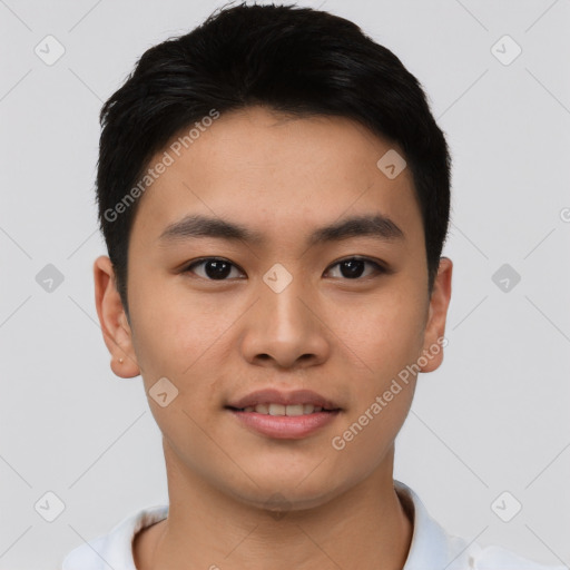 Joyful asian young-adult male with short  black hair and brown eyes