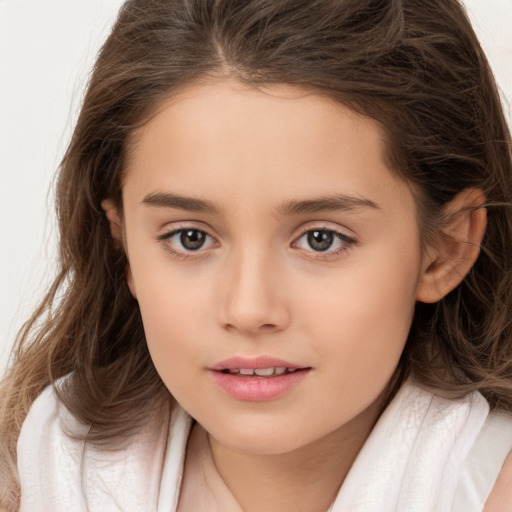 Joyful white child female with long  brown hair and brown eyes