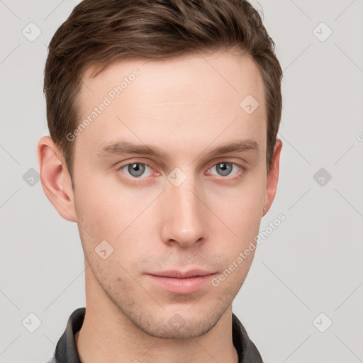 Neutral white young-adult male with short  brown hair and grey eyes