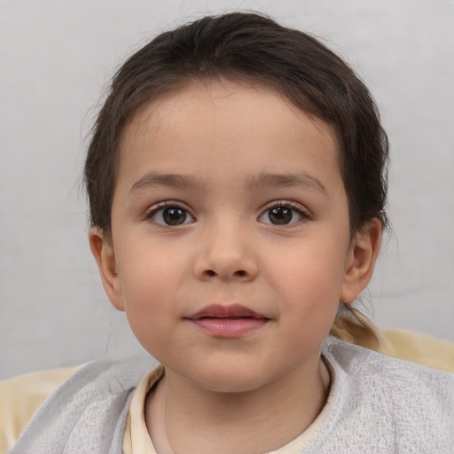 Neutral white child female with short  brown hair and brown eyes