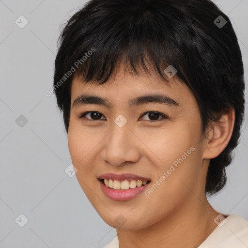 Joyful asian young-adult female with medium  brown hair and brown eyes