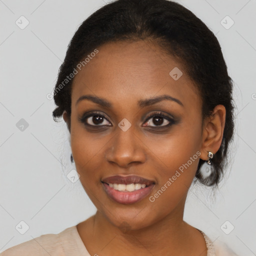 Joyful black young-adult female with medium  brown hair and brown eyes