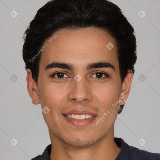 Joyful white young-adult male with short  black hair and brown eyes