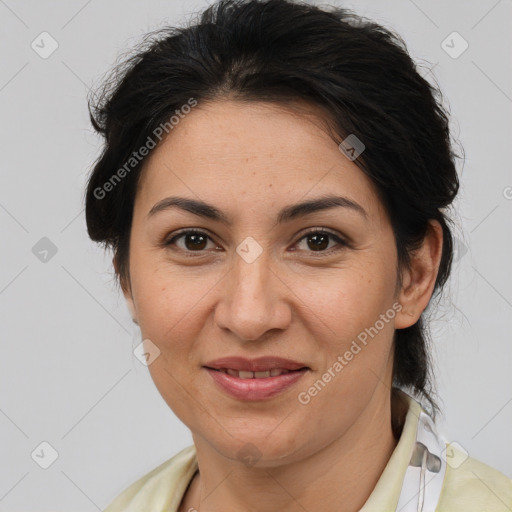 Joyful asian adult female with medium  brown hair and brown eyes