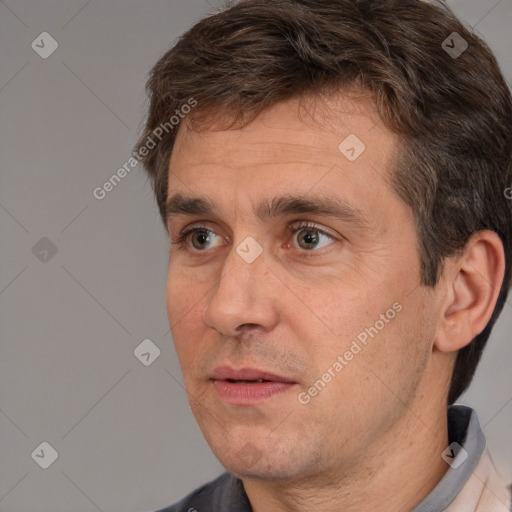 Neutral white adult male with short  brown hair and brown eyes