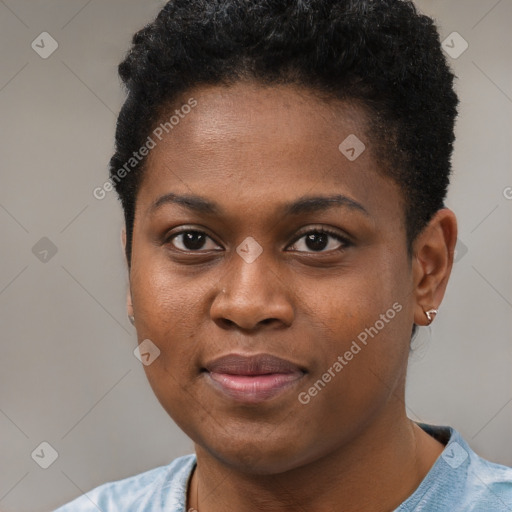 Joyful black young-adult female with short  brown hair and brown eyes