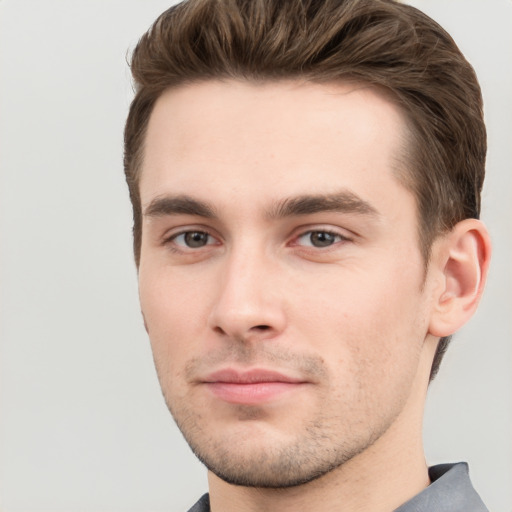 Neutral white young-adult male with short  brown hair and grey eyes