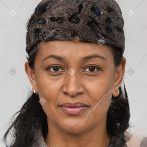 Joyful black adult female with short  brown hair and brown eyes