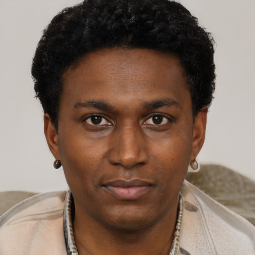 Neutral black young-adult male with short  black hair and brown eyes