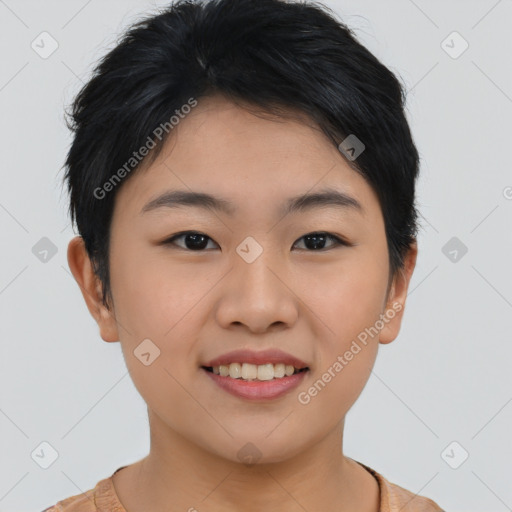 Joyful asian young-adult female with short  black hair and brown eyes