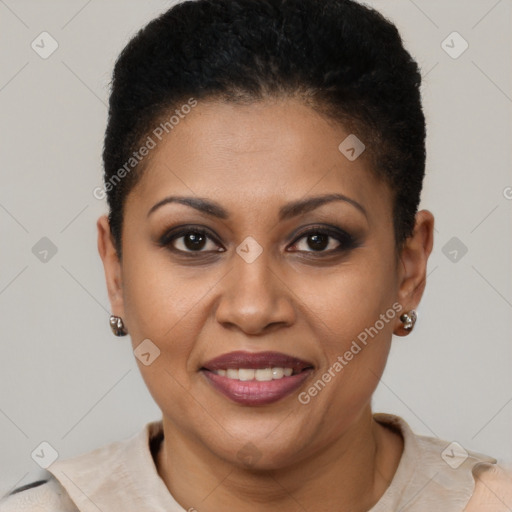Joyful black adult female with short  brown hair and brown eyes