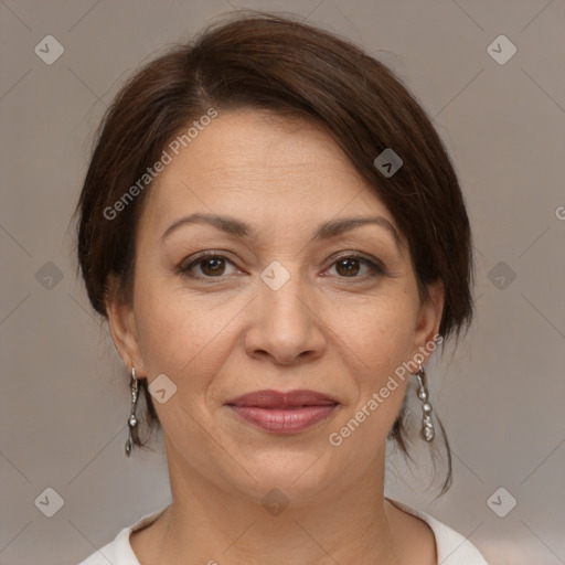 Joyful white adult female with medium  brown hair and brown eyes