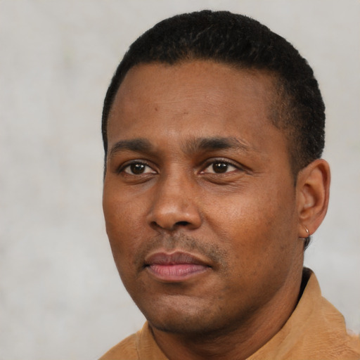Neutral black young-adult male with short  black hair and brown eyes