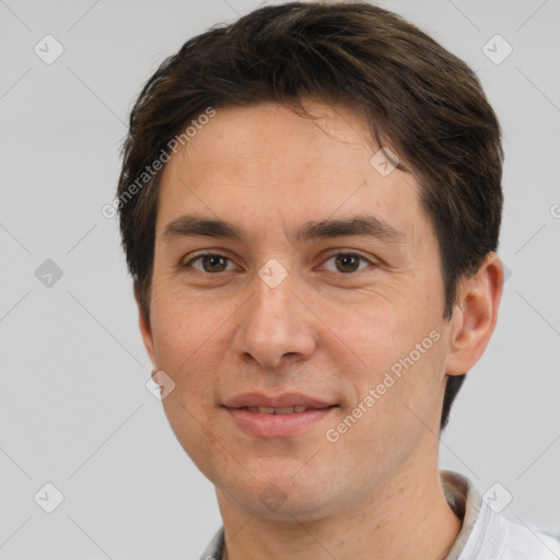 Joyful white young-adult male with short  brown hair and brown eyes