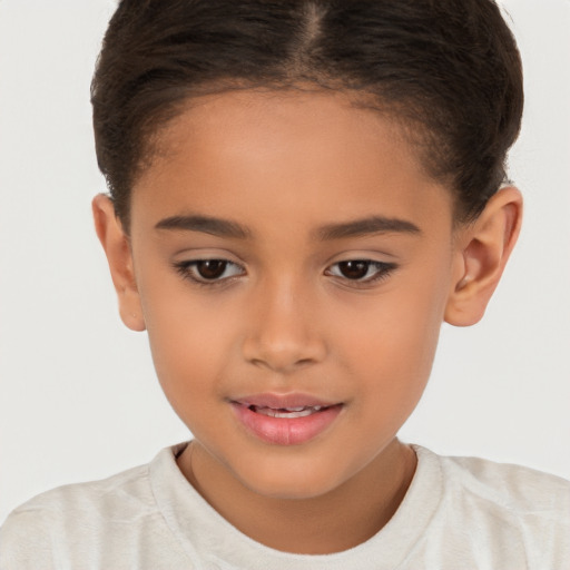 Joyful white child female with short  brown hair and brown eyes