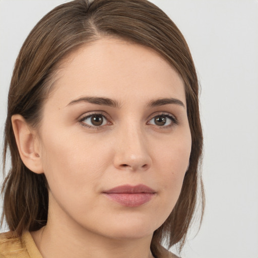 Neutral white young-adult female with medium  brown hair and brown eyes