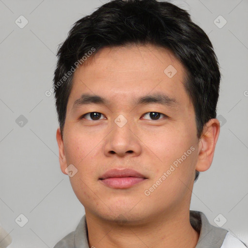 Neutral asian young-adult male with short  black hair and brown eyes