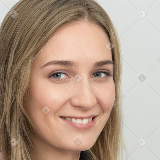 Joyful white young-adult female with long  brown hair and green eyes