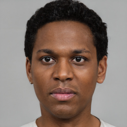 Neutral black young-adult male with short  black hair and brown eyes