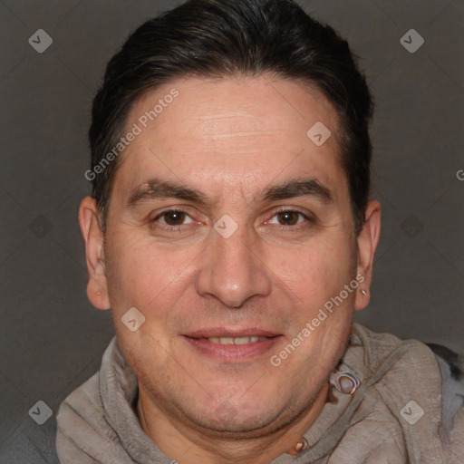 Joyful white adult male with short  brown hair and brown eyes