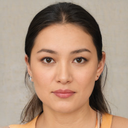 Joyful white young-adult female with medium  brown hair and brown eyes