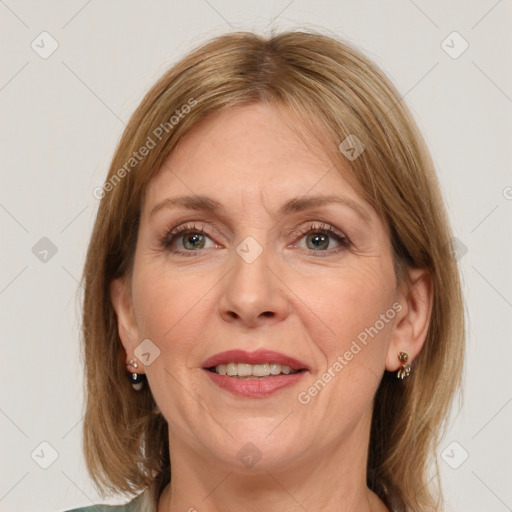 Joyful white adult female with medium  brown hair and grey eyes