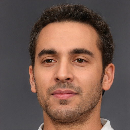 Neutral white young-adult male with short  brown hair and brown eyes