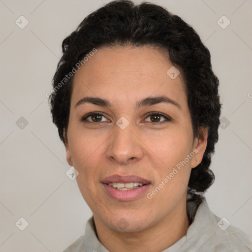 Joyful white adult female with short  brown hair and brown eyes