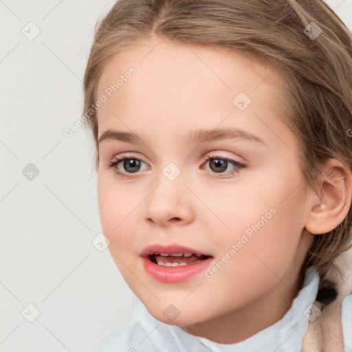 Joyful white child female with medium  brown hair and grey eyes