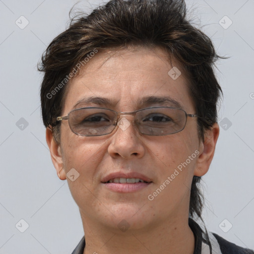 Joyful white adult female with short  brown hair and brown eyes