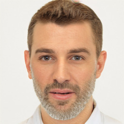 Joyful white adult male with short  brown hair and brown eyes
