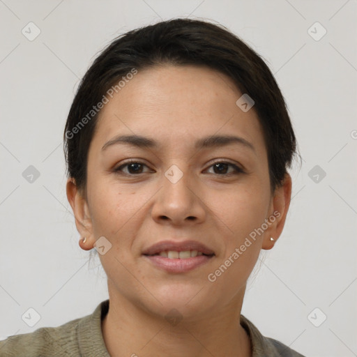 Joyful latino young-adult female with short  brown hair and brown eyes