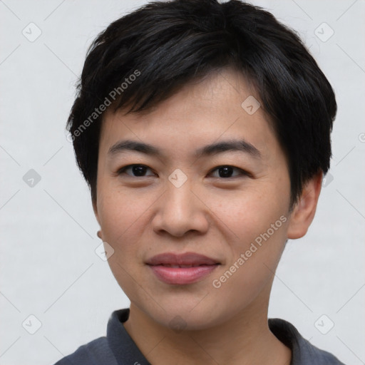 Joyful asian young-adult male with short  brown hair and brown eyes