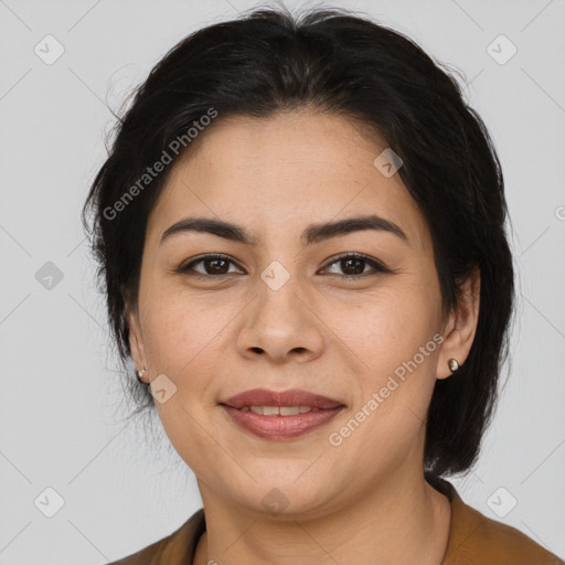 Joyful asian adult female with medium  brown hair and brown eyes