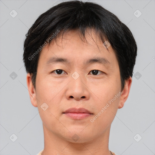 Neutral asian young-adult male with short  brown hair and brown eyes