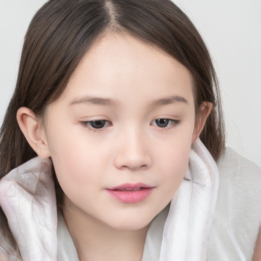 Joyful white child female with long  brown hair and brown eyes