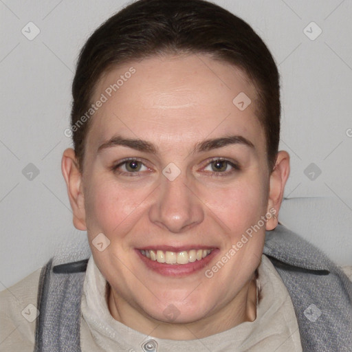 Joyful white adult female with short  brown hair and brown eyes