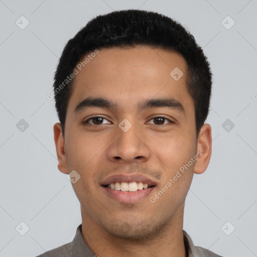 Joyful latino young-adult male with short  black hair and brown eyes