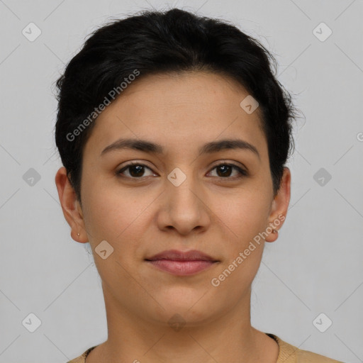 Joyful latino young-adult female with short  brown hair and brown eyes