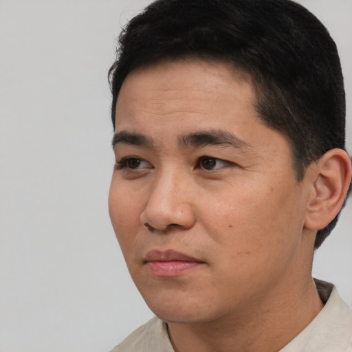 Neutral asian young-adult male with short  black hair and brown eyes