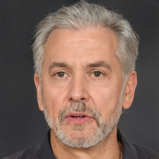 Neutral white middle-aged male with short  gray hair and brown eyes