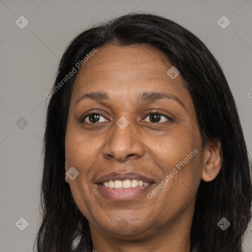 Joyful latino adult female with long  brown hair and brown eyes