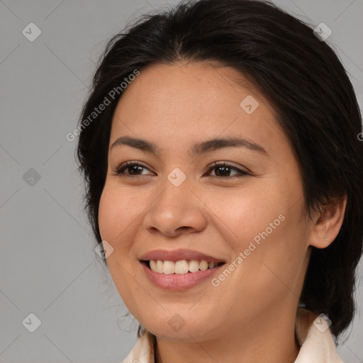 Joyful white young-adult female with medium  brown hair and brown eyes