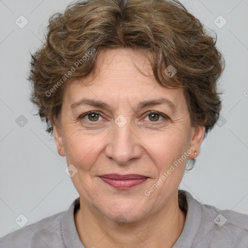 Joyful white adult female with short  brown hair and brown eyes