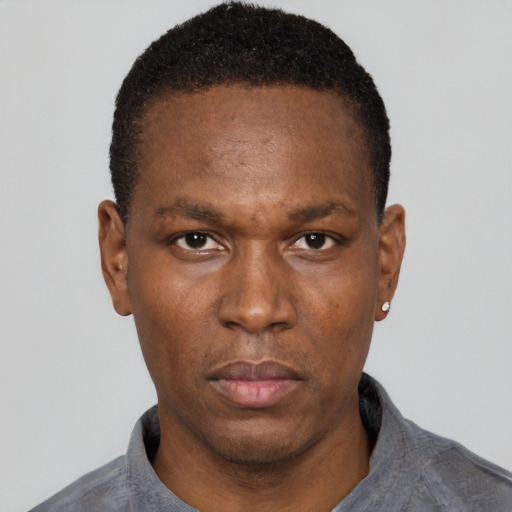 Neutral black adult male with short  black hair and brown eyes
