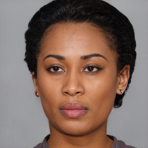 Neutral latino young-adult female with short  black hair and brown eyes