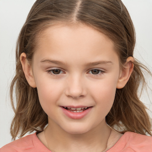 Joyful white child female with medium  brown hair and brown eyes