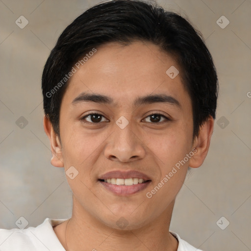 Joyful latino young-adult male with short  brown hair and brown eyes