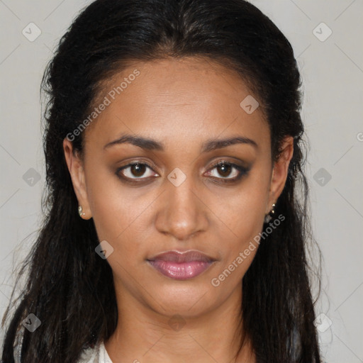 Joyful black young-adult female with long  brown hair and brown eyes